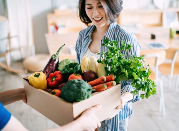 cheerful-young-asian-woman-receiving-a-box-full-of-royalty-free-image-1686340421 cheerful-young-asian-woman-receiving-a-box-full-of-royalty-free-image-1686340421